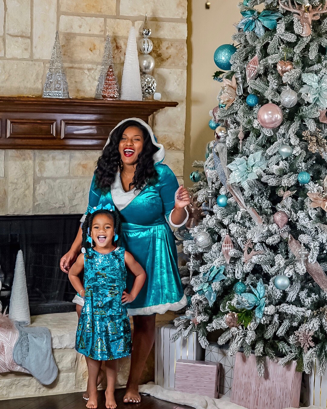 Beautifuly black mom and daughter matching goals as we teach you how to decorate a glam Christmas tree.